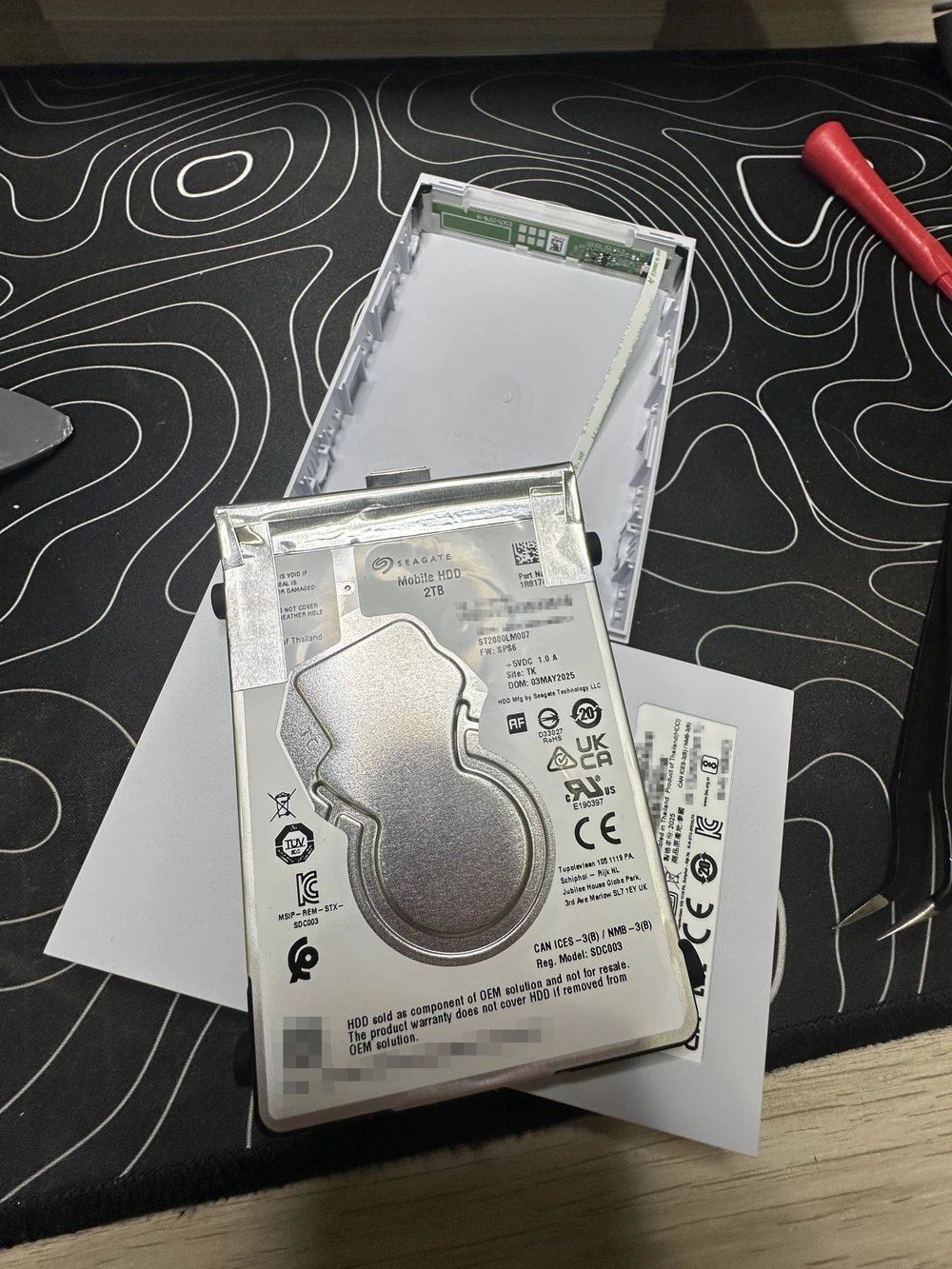 Bottom part of the enclosure removed, drive still connected to the LED controller
