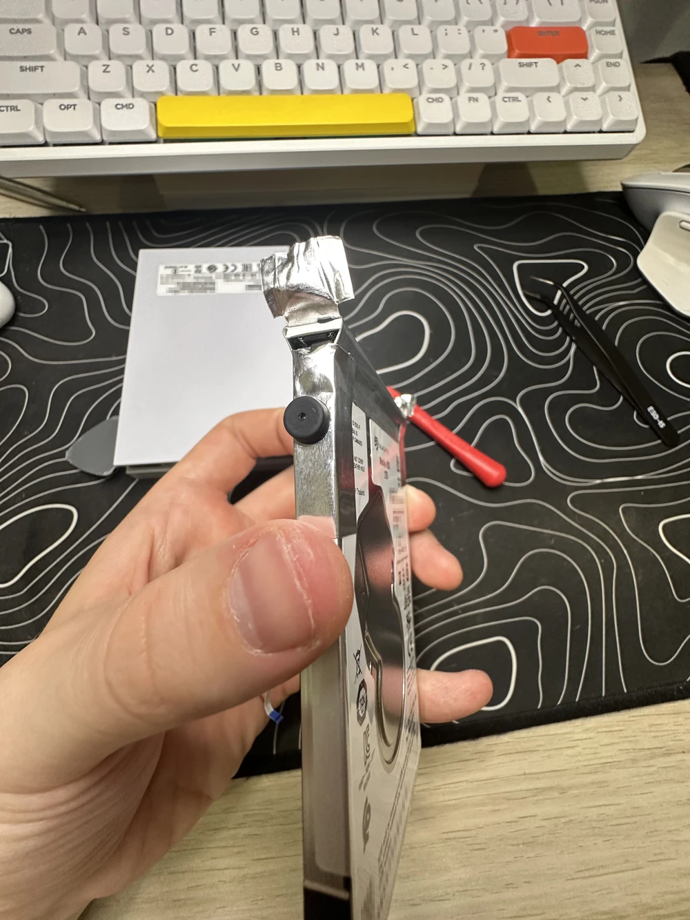 Starting to peel off the “foil” wrap